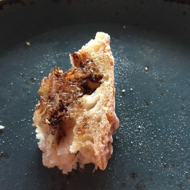 A chunk of Smolt's divine bread dipped in oil and balsamic...